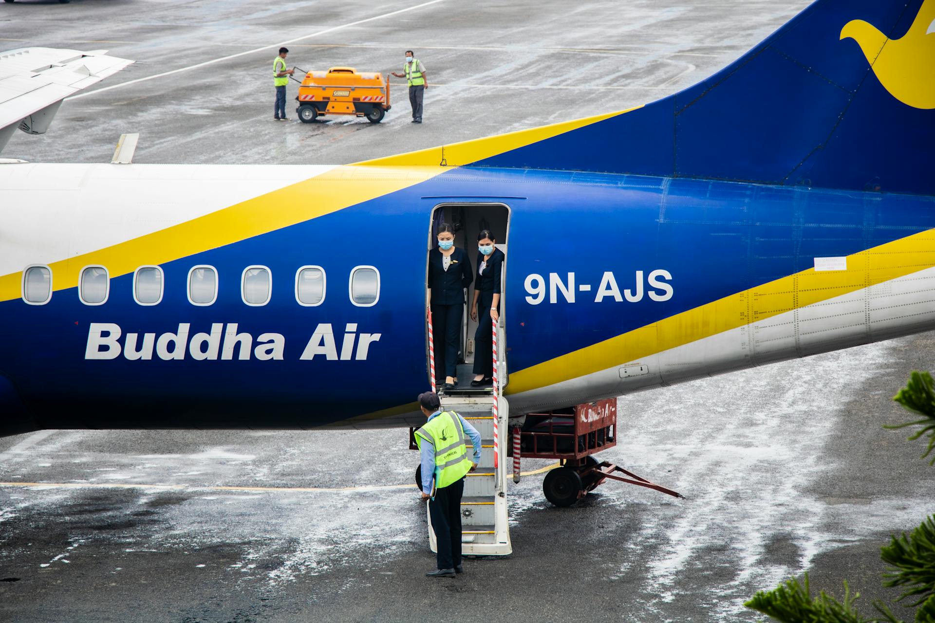 Stewardesses in Entrance of Airliner