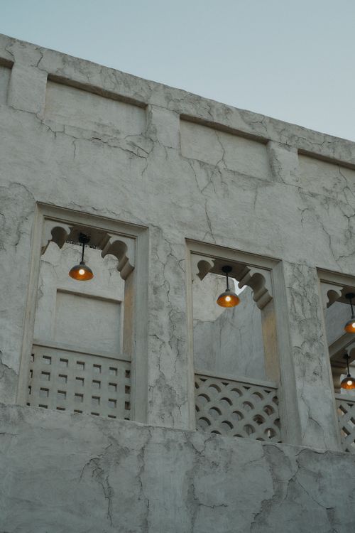 Free Elegant facade of Al Shindagha Museum in Dubai showcasing traditional Arabic architecture. Stock Photo