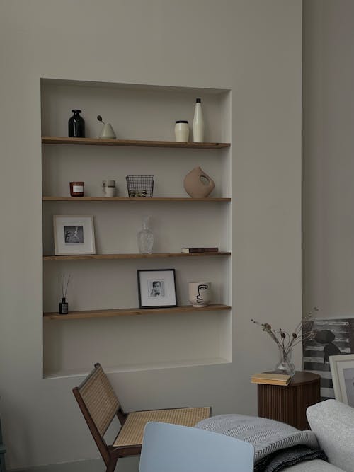 Free Brown Wooden Wall Mounted Shelf Stock Photo