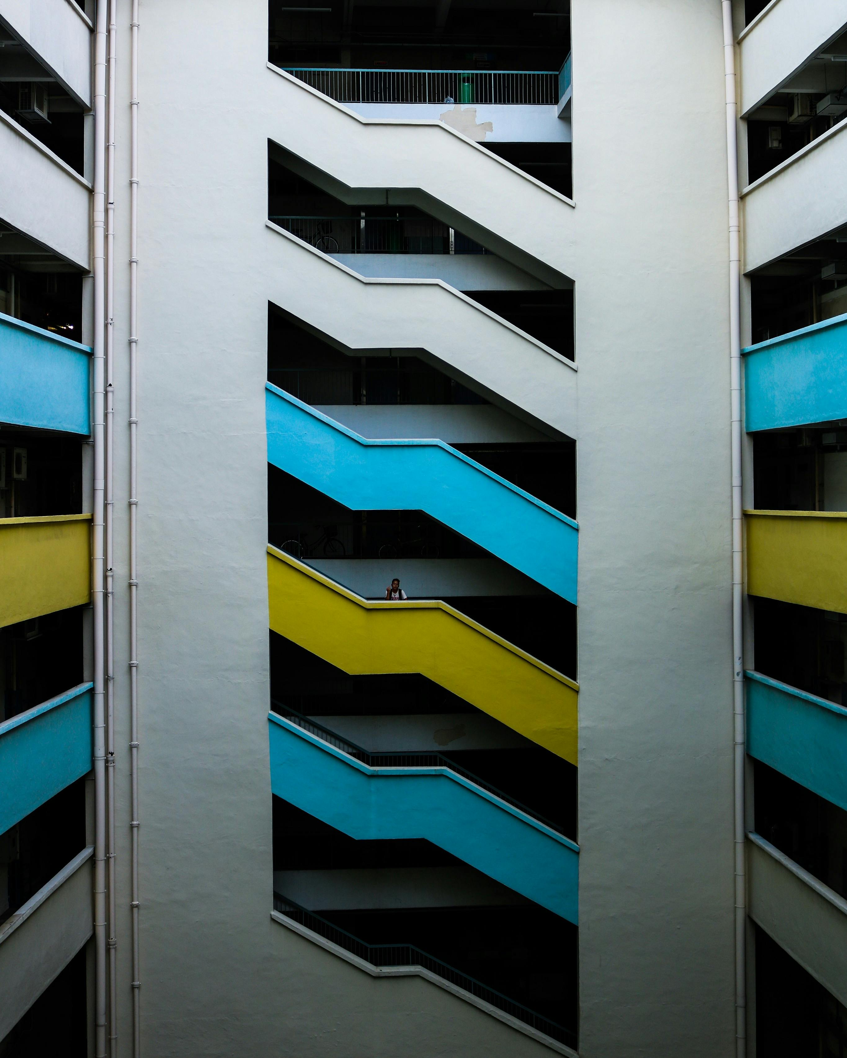 Vertical shot of a vibrant staircase design in a Singapore building.