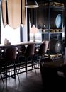 Table and Chairs by Window