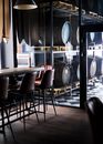 Kegs, Chairs and Table in Building