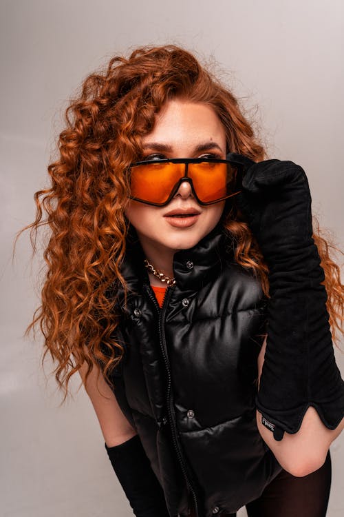 Portrait of a Woman with Red Curly Hair