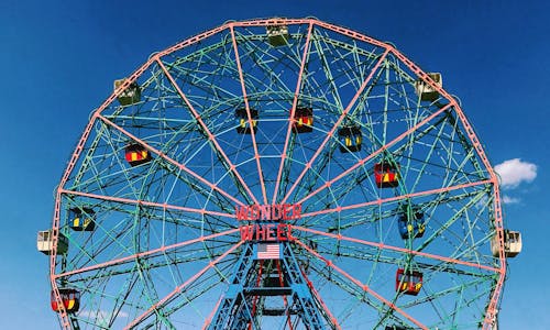 Ferris Wheel Under the Blue Sky