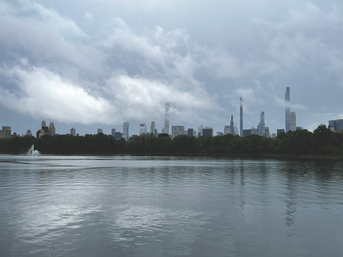 Free Stunning view of NYC skyline from Central Park Reservoir on a cloudy day. Stock Photo