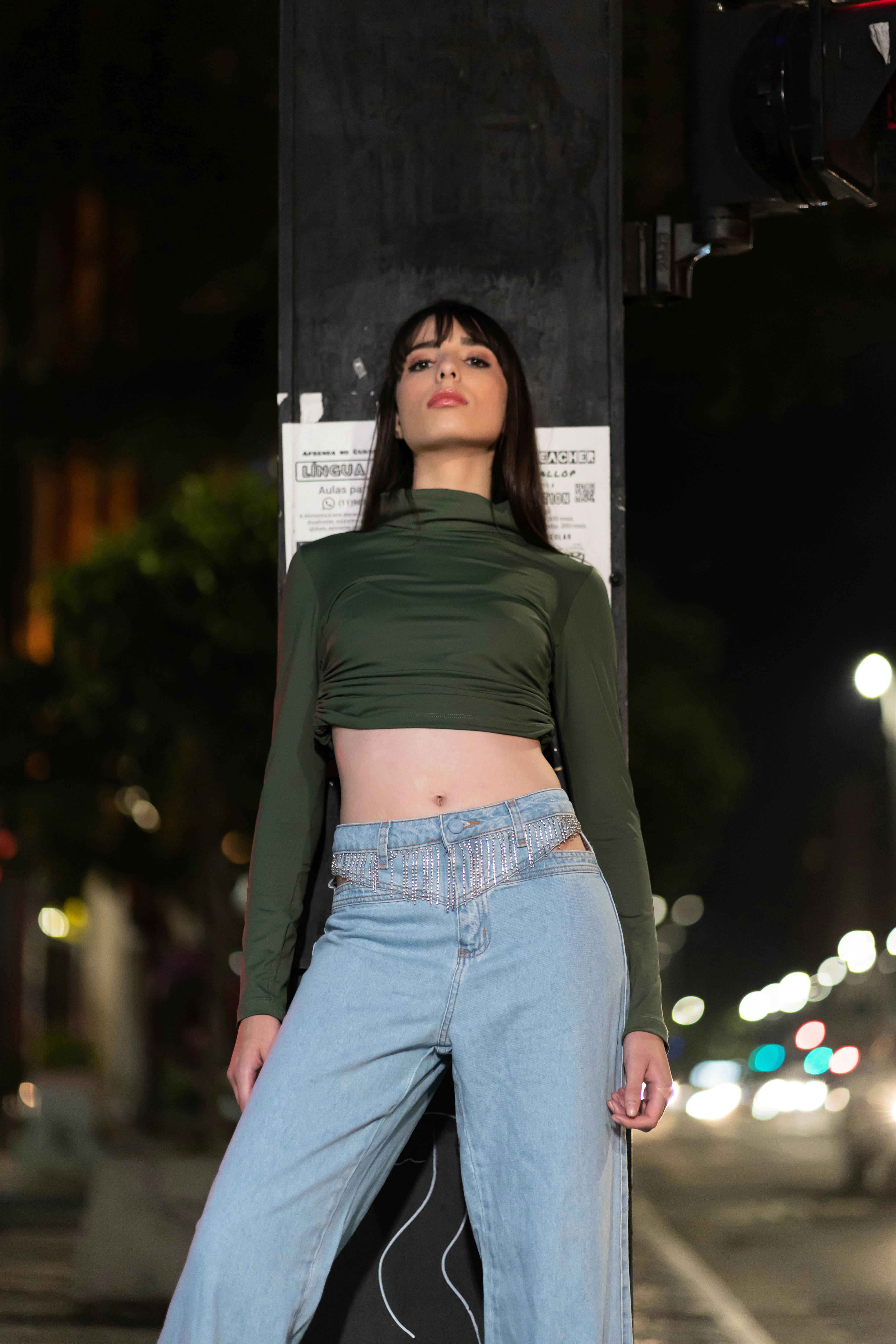 Woman in Black Crop Top and Denim Pants · Free Stock Photo