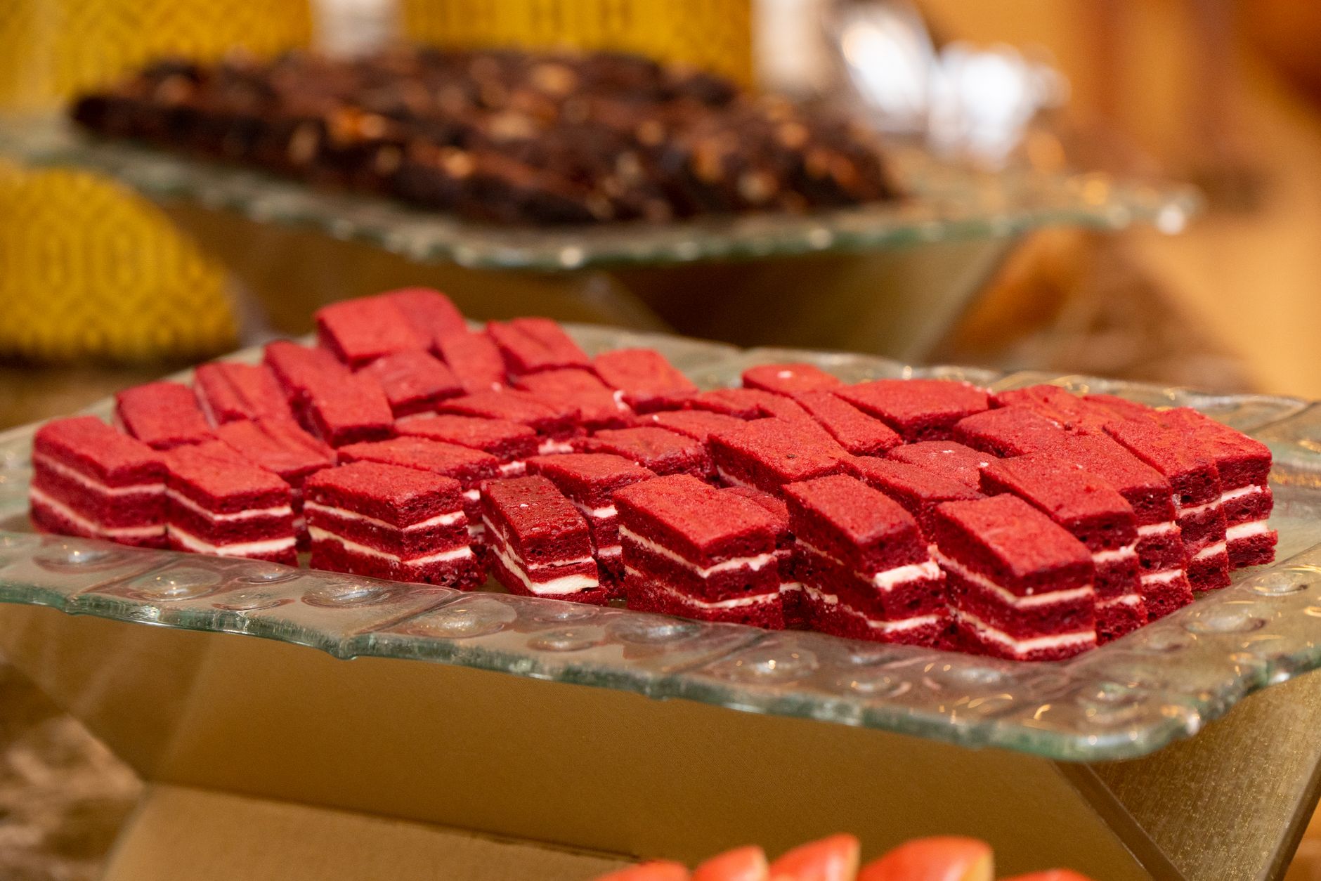 Red velvet bars cooling in baking pan