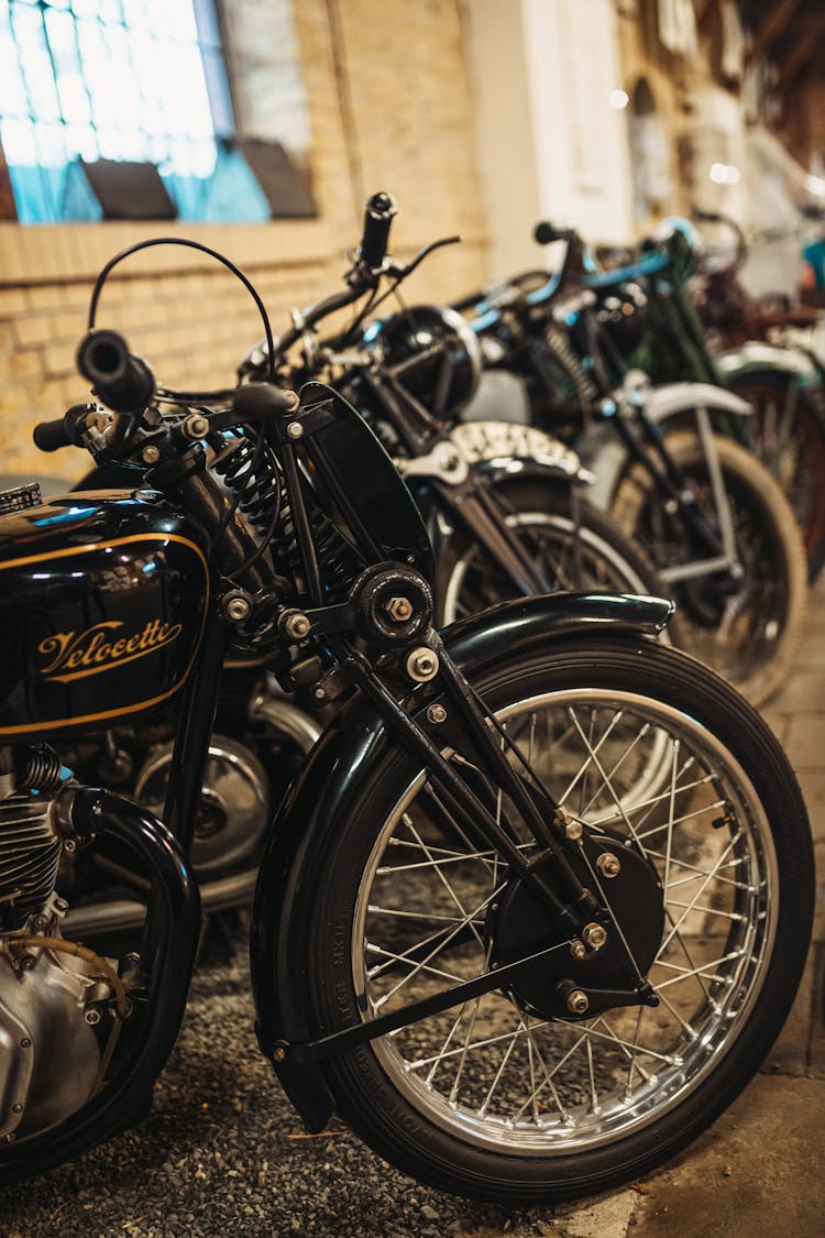 Row Of Motorcycles Parked On Street