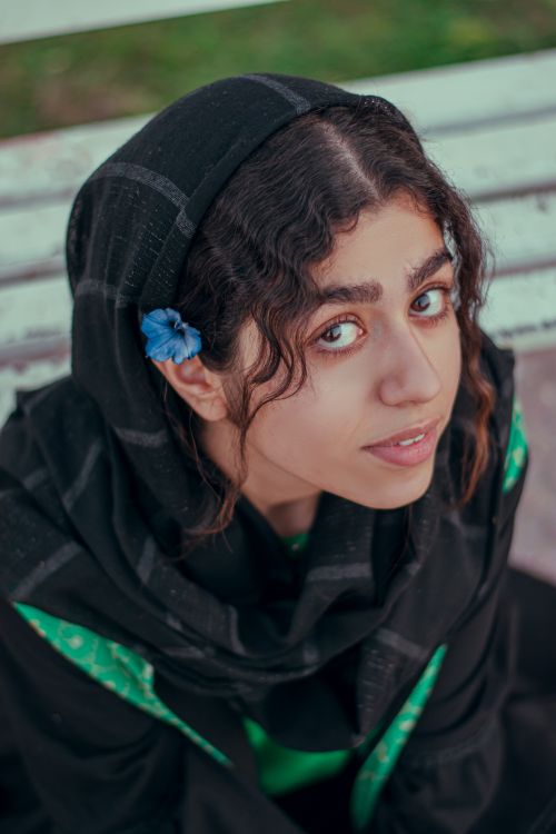 Portrait of a Young Woman in Black Scarf · Free Stock Photo