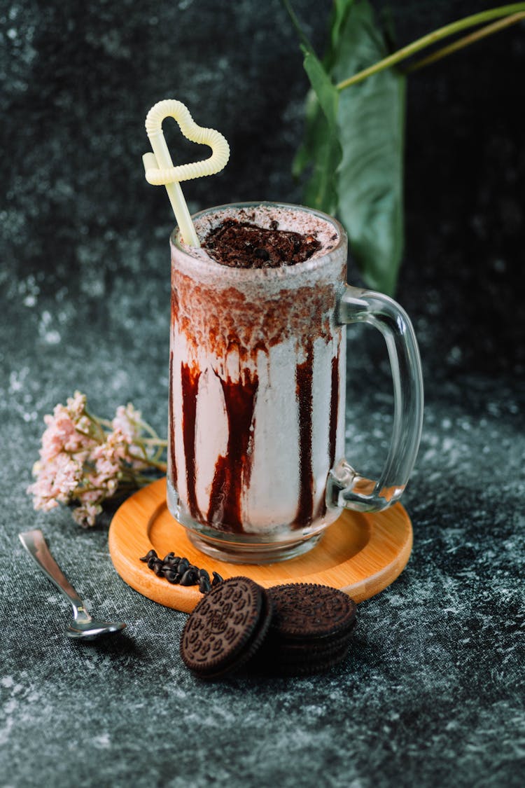 Shot Of Chocolate Milkshake And Cookies