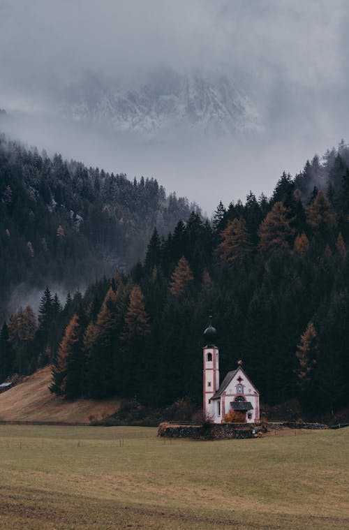 Clouds over Church near Forest