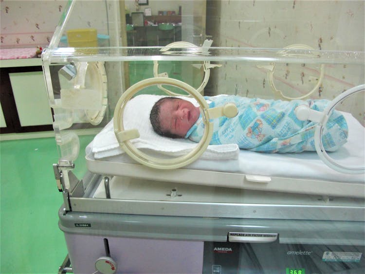 Close-up Of A Baby In An Incubator