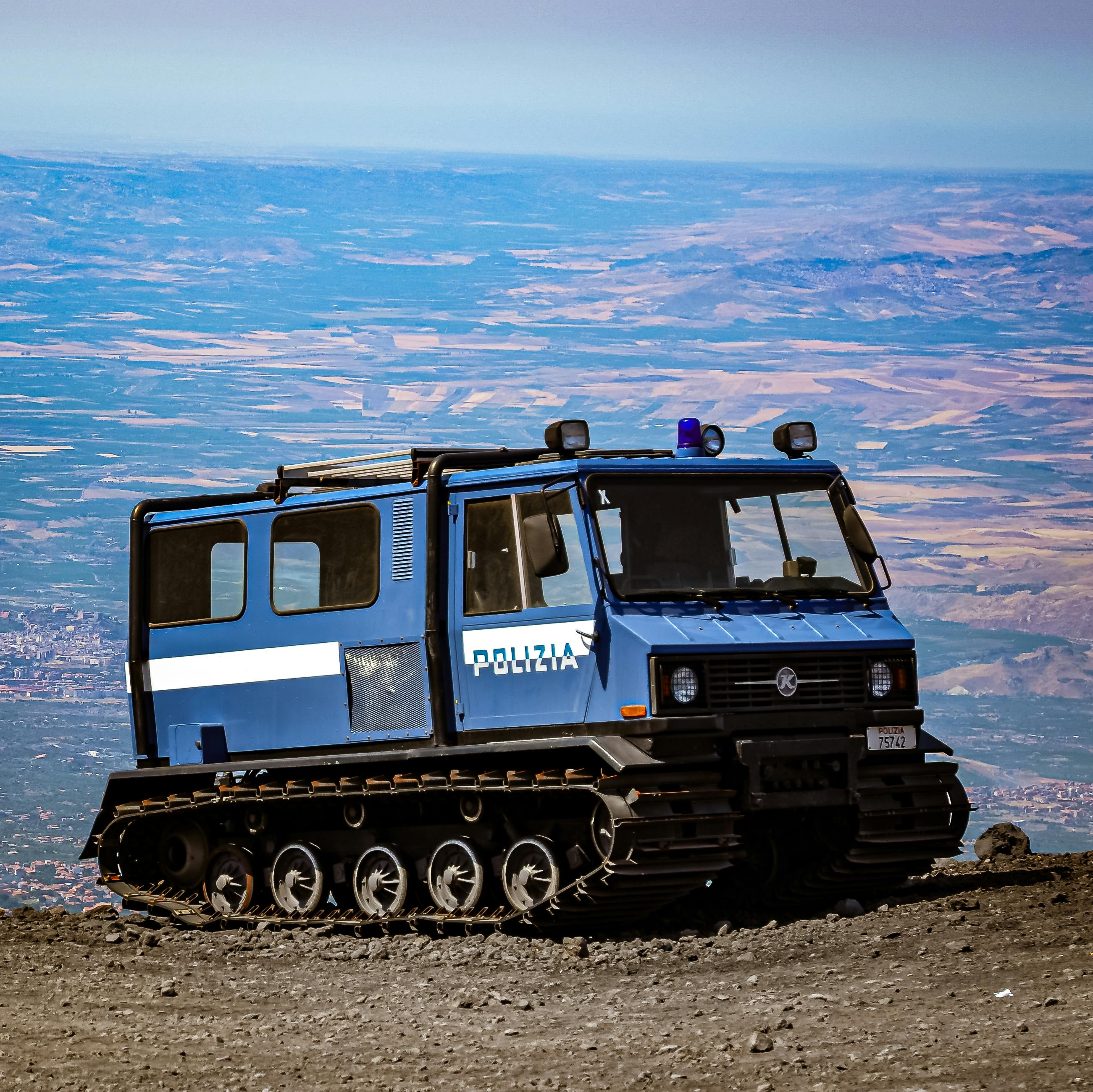 police tracked vehicle on the beach