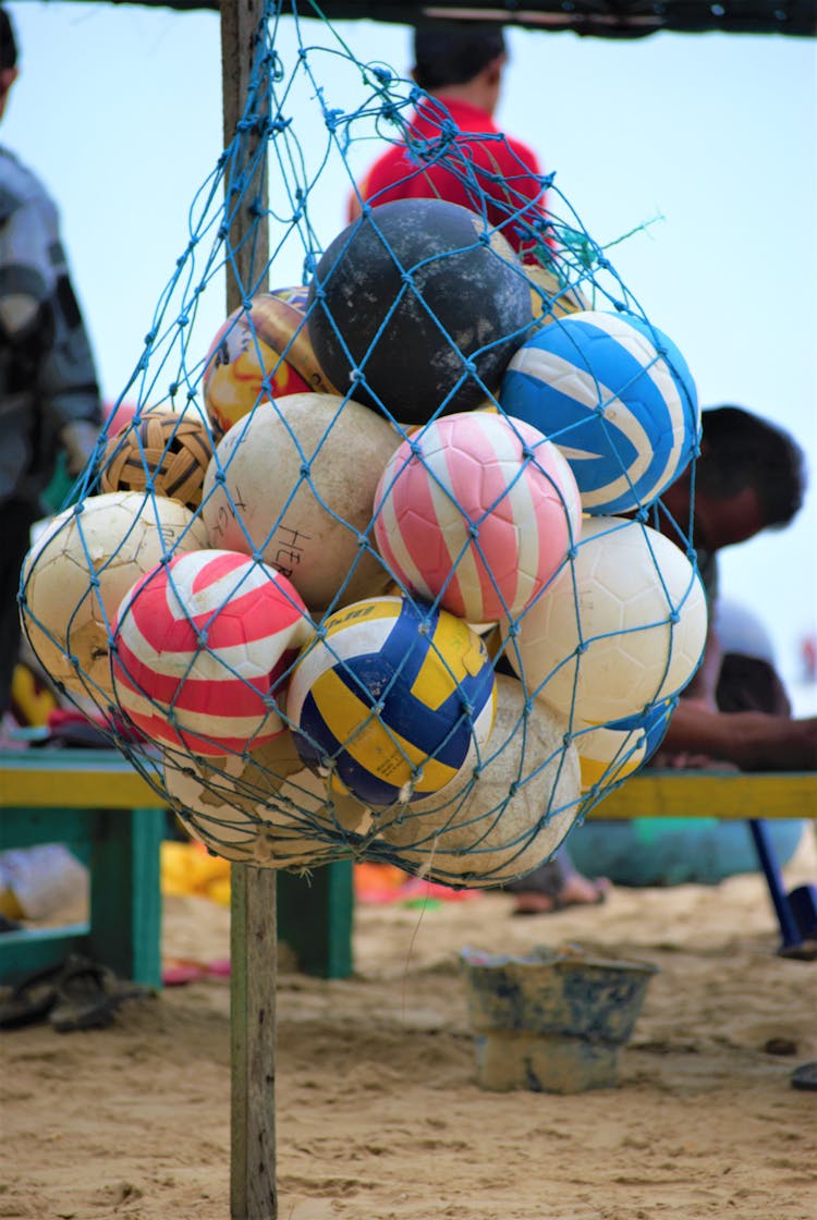 Beach Balls In Blue Net Bag