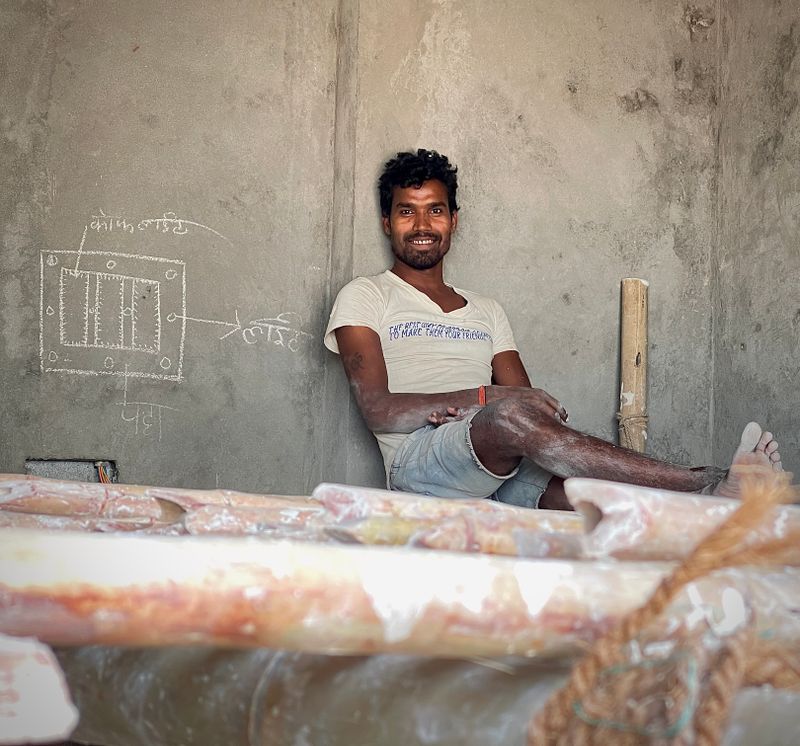 Smiling construction worker takes a break