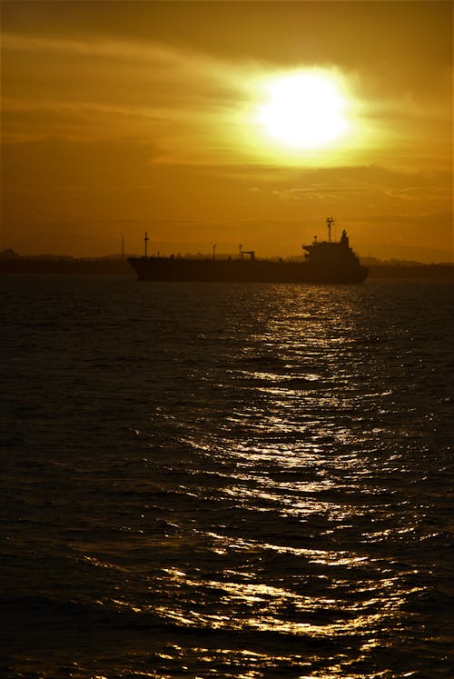 Silhouette of a Ship During Sunset