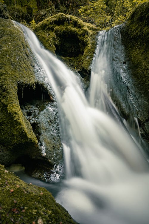Free Water Falls on Green Moss Covered Rocks Stock Photo