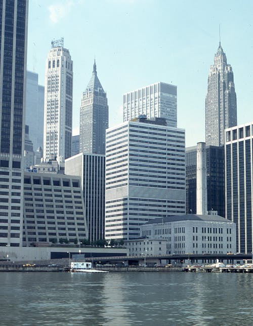 Concrete Buildings Near Body of Water