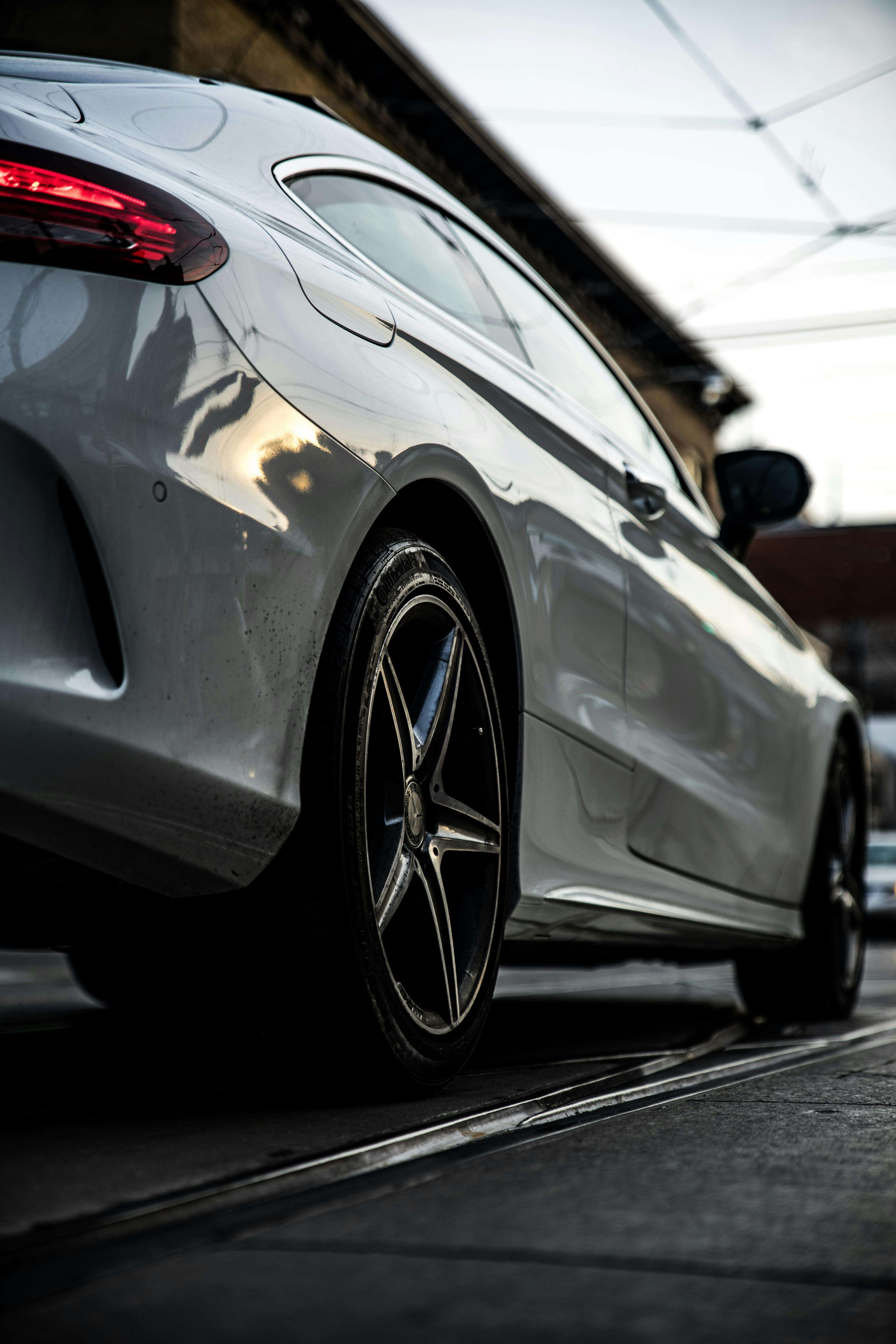 Close-Up Photography of Silver Sports Car