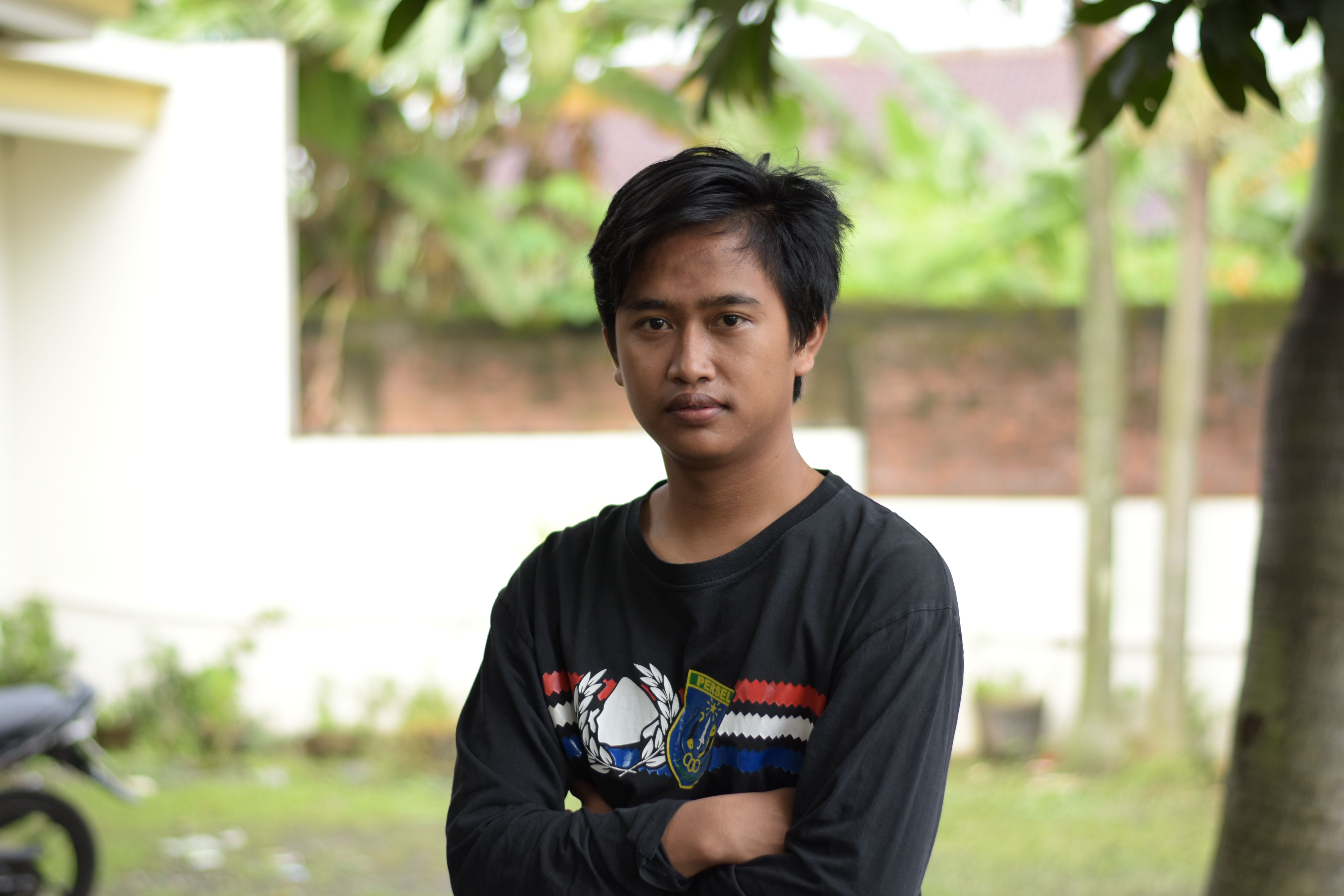 A Man in Black Crew Neck Long Sleeve Shirt