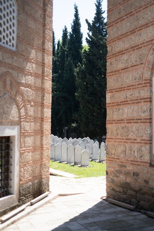 Tombstones on Grass Field