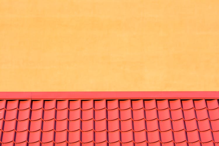 Orange Wall And Red Roofing 