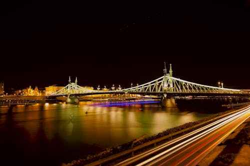 Time Lapse Photography of Bridge during Night Time