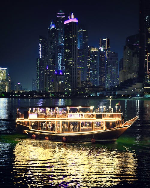Free Illuminated Boat in Dubai at Night Stock Photo