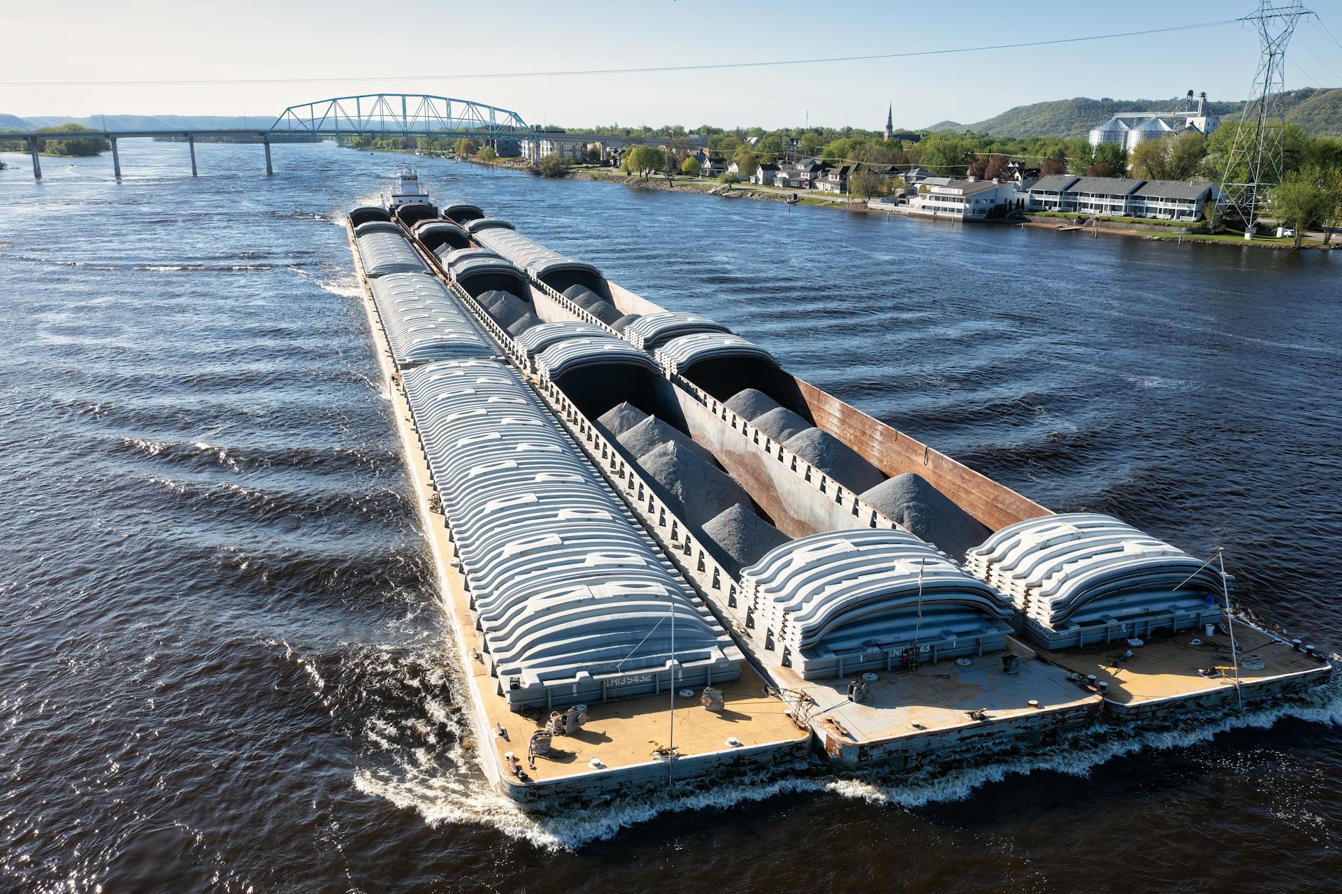 Gray Barge on the River