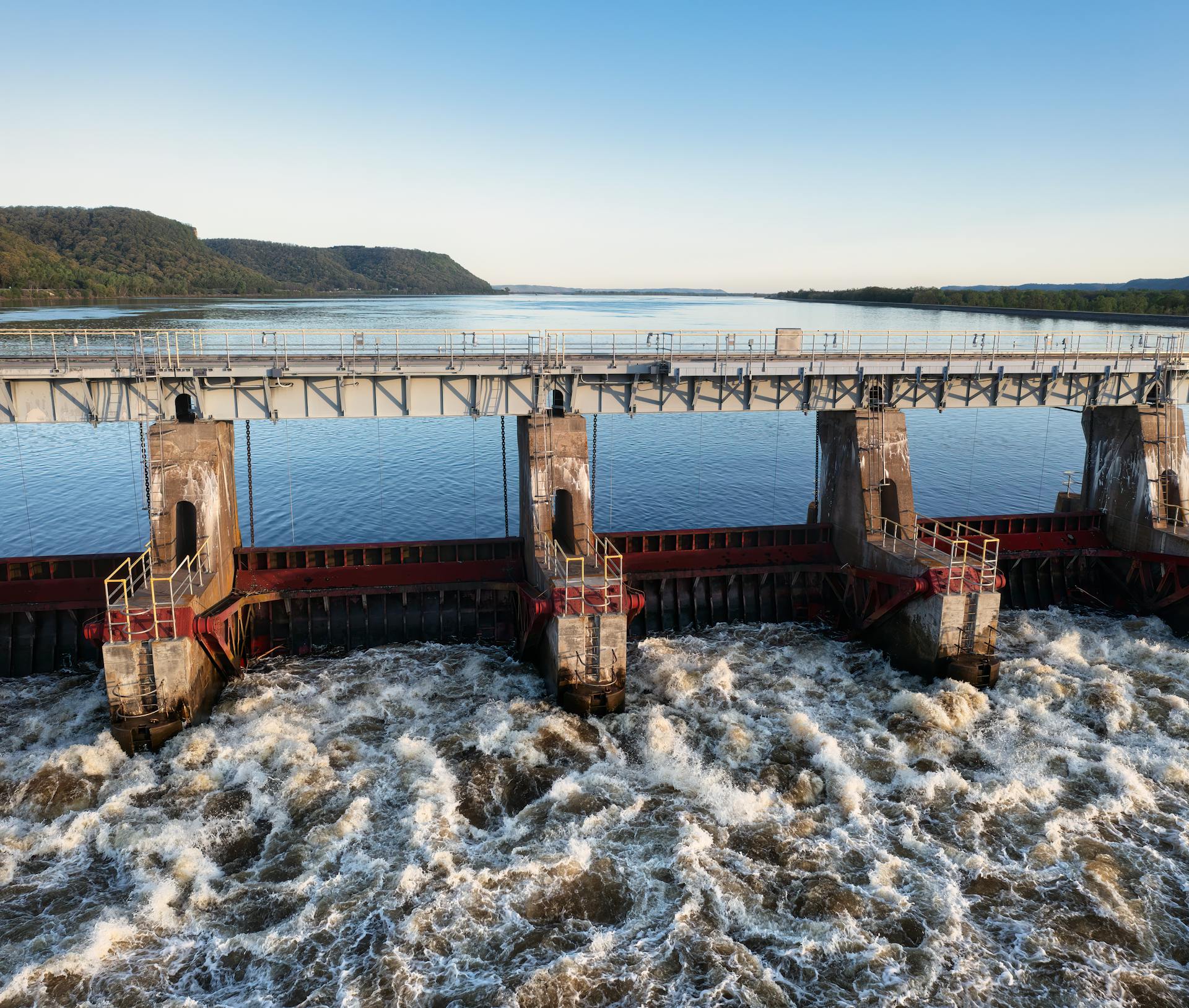 Aerial view of a lock and dam with rushing water in Minnesota, USA.