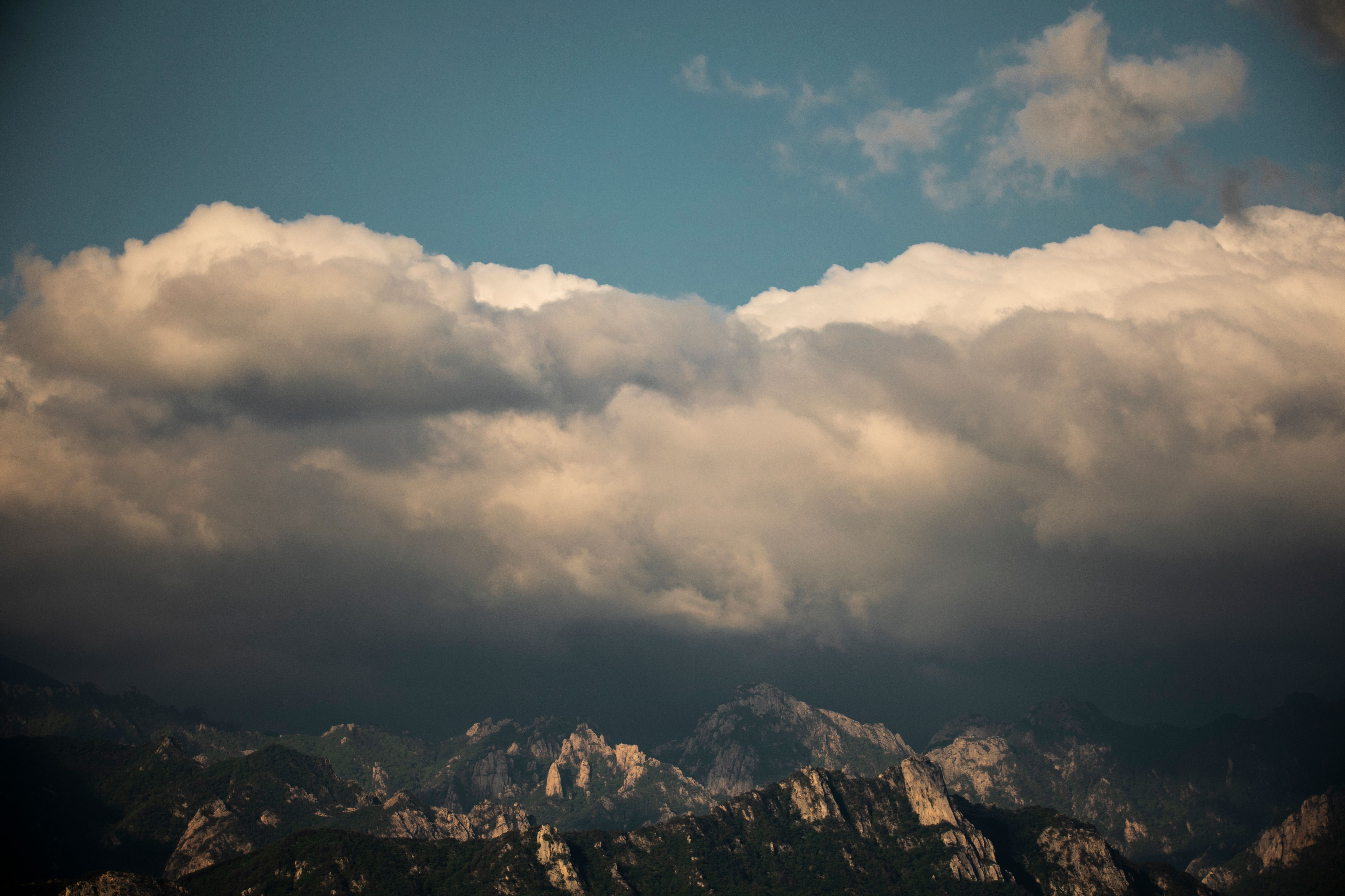 White Clouds over Mountains · Free Stock Photo