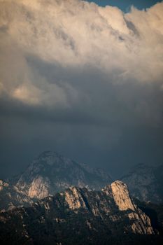 Dramatic landscape of Seoraksan mountains under cloudy sky in Sokcho, South Korea.