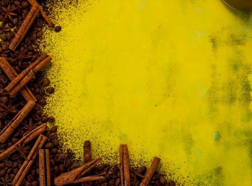 Cinnamon Barks on Yellow Table