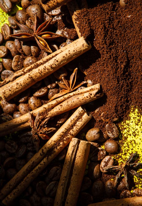 Overhead Shot of Cinnamon Sticks on Coffee Beans