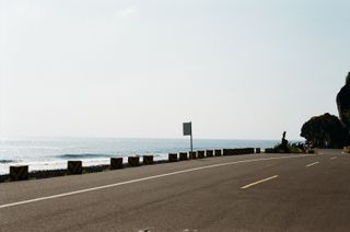 Coast road beside the sea — Tacoö Chang on Pexels