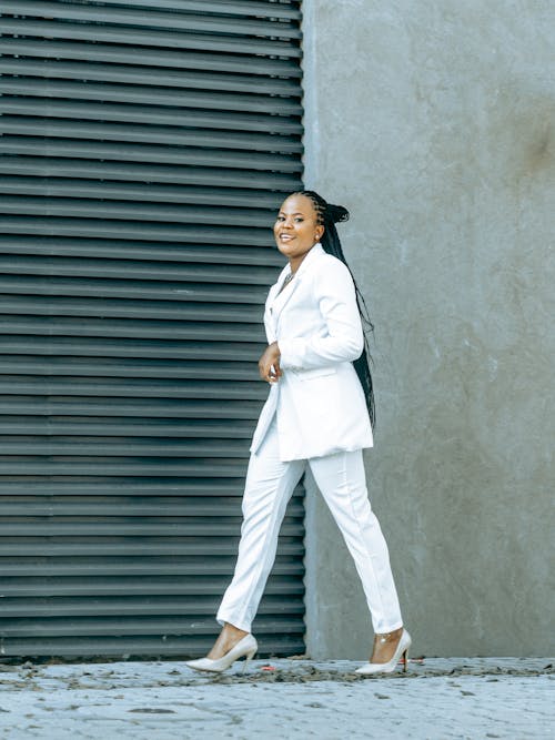 Woman Wearing a White Suit