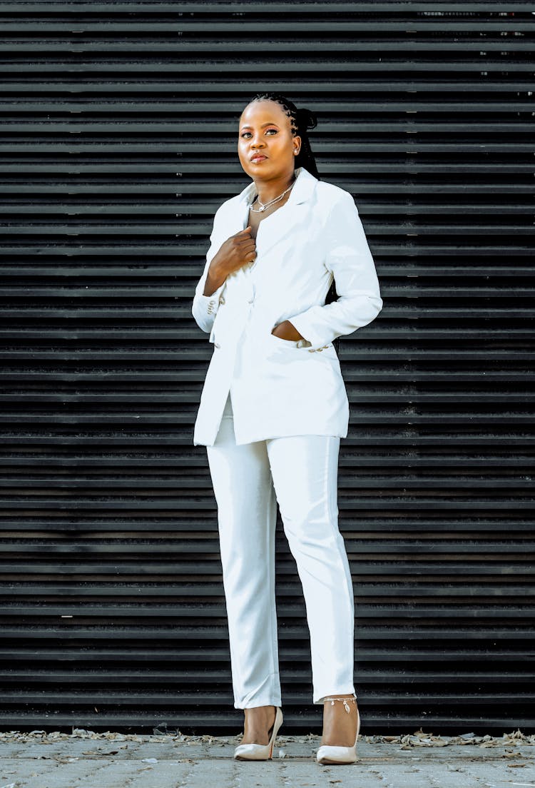 Photo Of A Woman In A White Suit