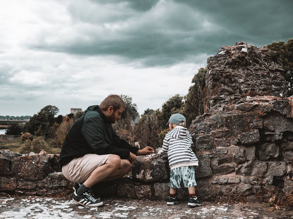 Free Father and Son Visit Old Ruins Stock Photo
