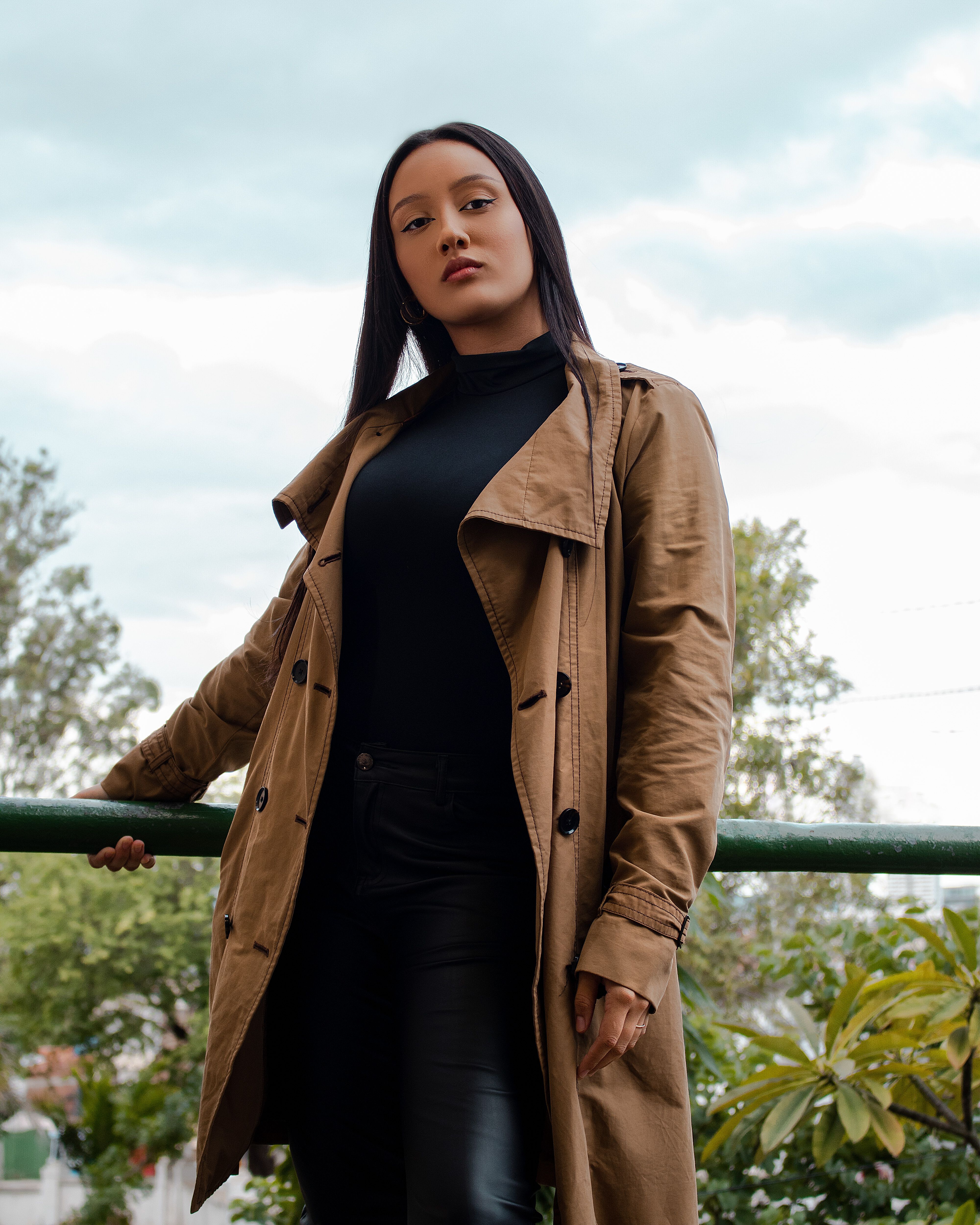 Photograph of a Woman Wearing a Brown Coat · Free Stock Photo