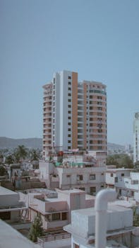 View of a tall residential building in the urban landscape of Karachi, Pakistan.