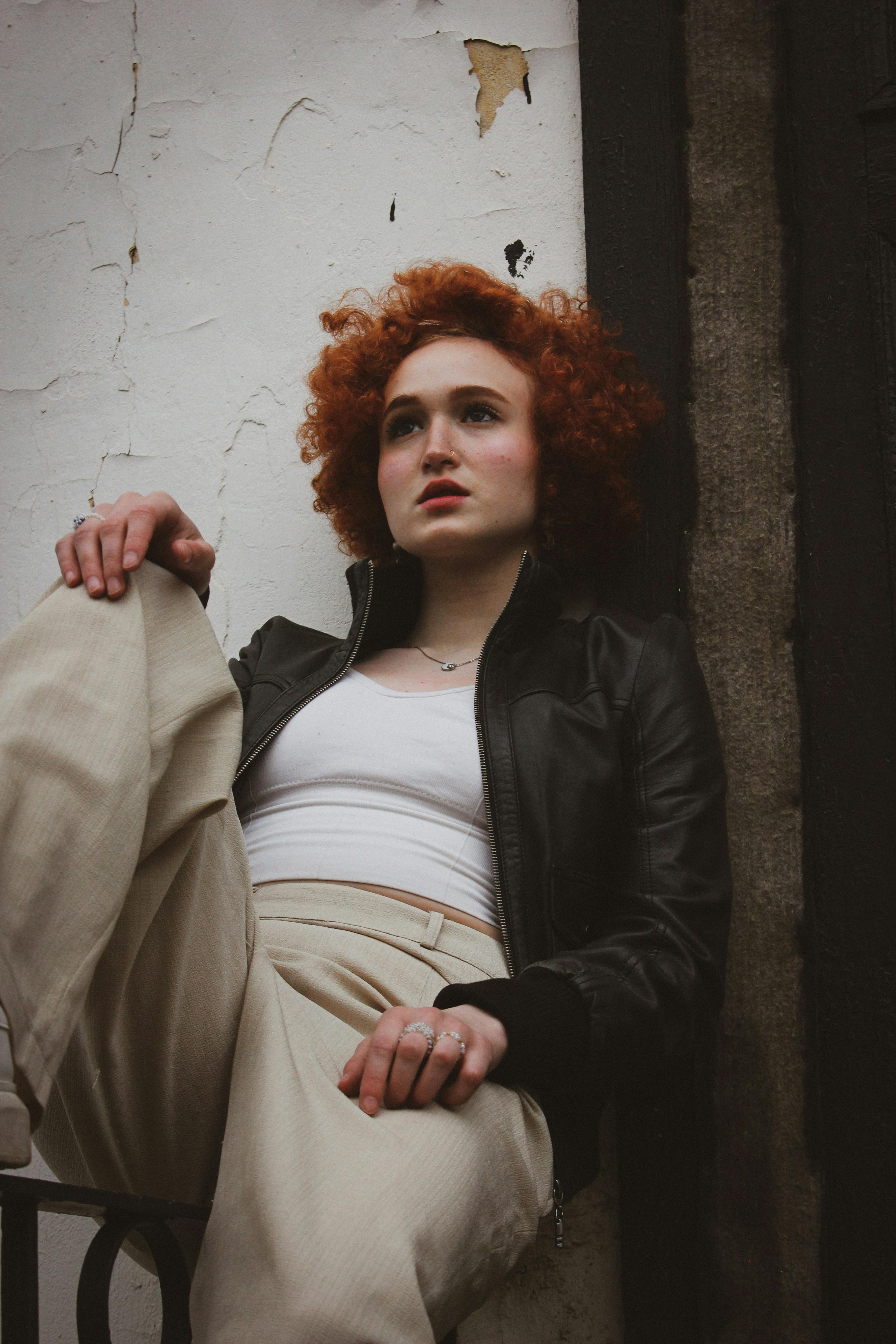 Girl with Red Hair Wearing a Leather Jacket