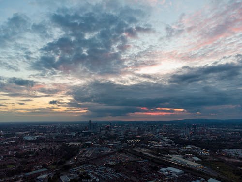 Buildings Under the Clouds During Sunset