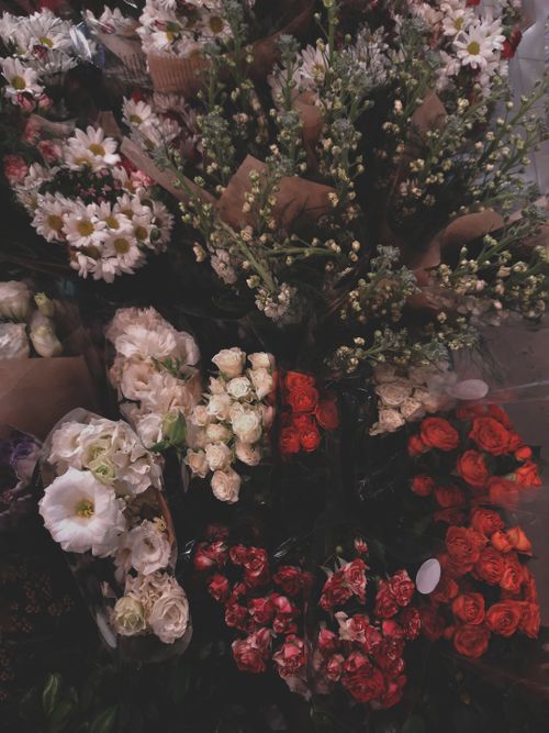 Free A vibrant assortment of colorful flower bouquets arranged in a top-view display, perfect for nature and floral themes. Stock Photo