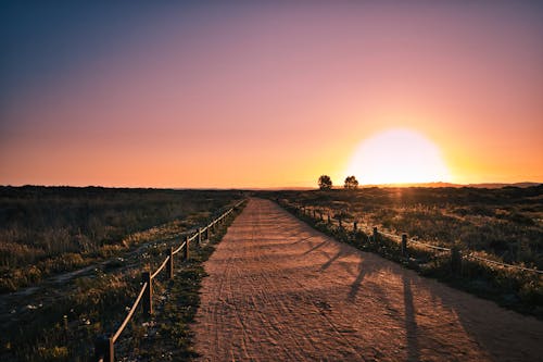 Photos gratuites de campagne, chemin de terre, coucher de soleil