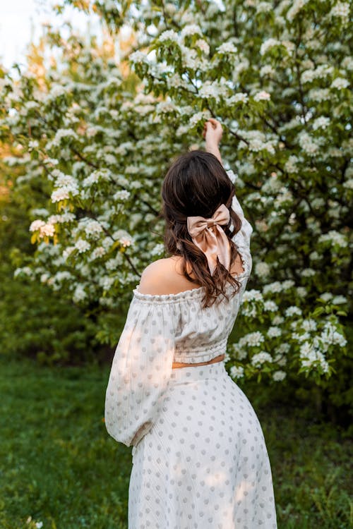 Backview of a Beautiful Woman in White Dress