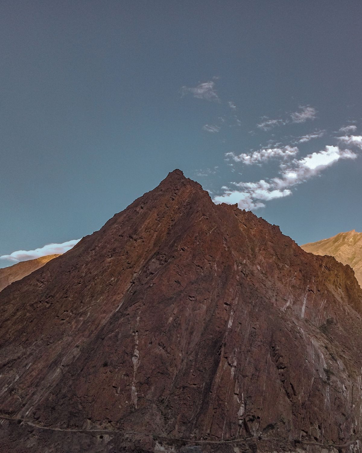 A Brown Rocky Mountain Under the Blue Sky · Free Stock Photo