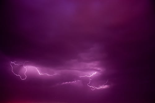 Photo of a Thunderbolt in the Violet Sky