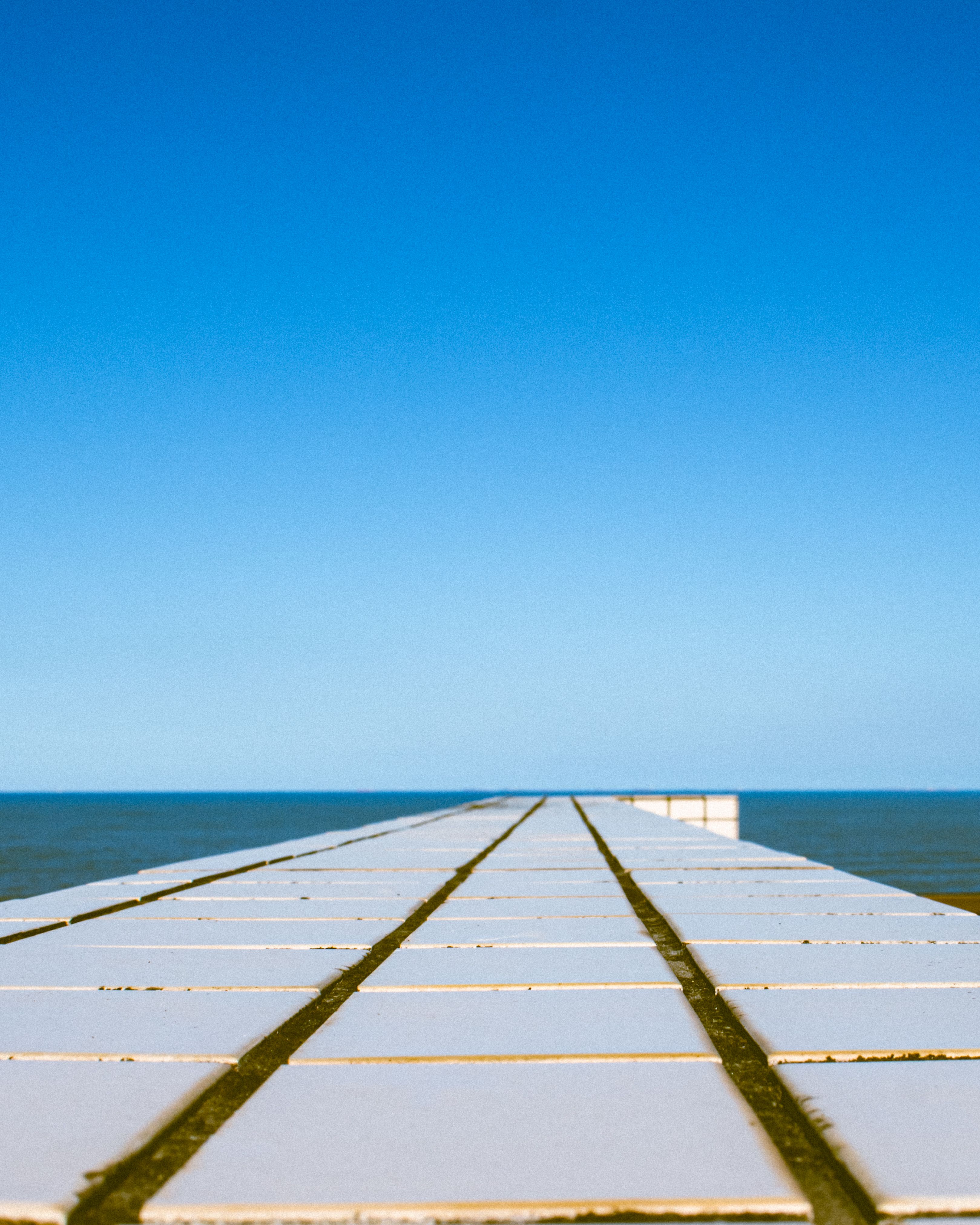 Empty Pier On Promenade Free Stock Photo empty-pier-on-promenade-free-stock-photo