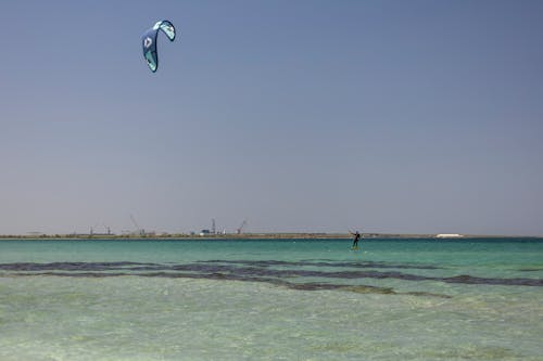 Man Wind Surfing on Sea