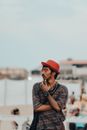 Photo of a Man Wearing a Red Hat
